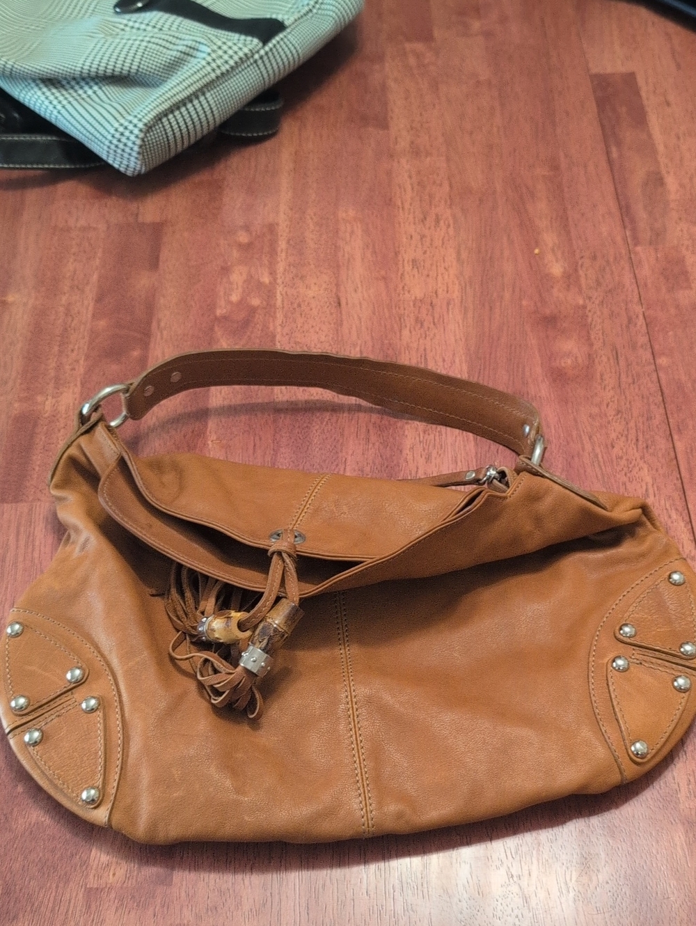 Casual Tan Leather Shoulder Bag with Tassel Accent